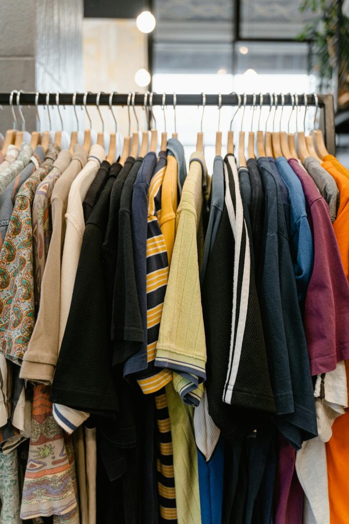 A rack full of t-shirts for males